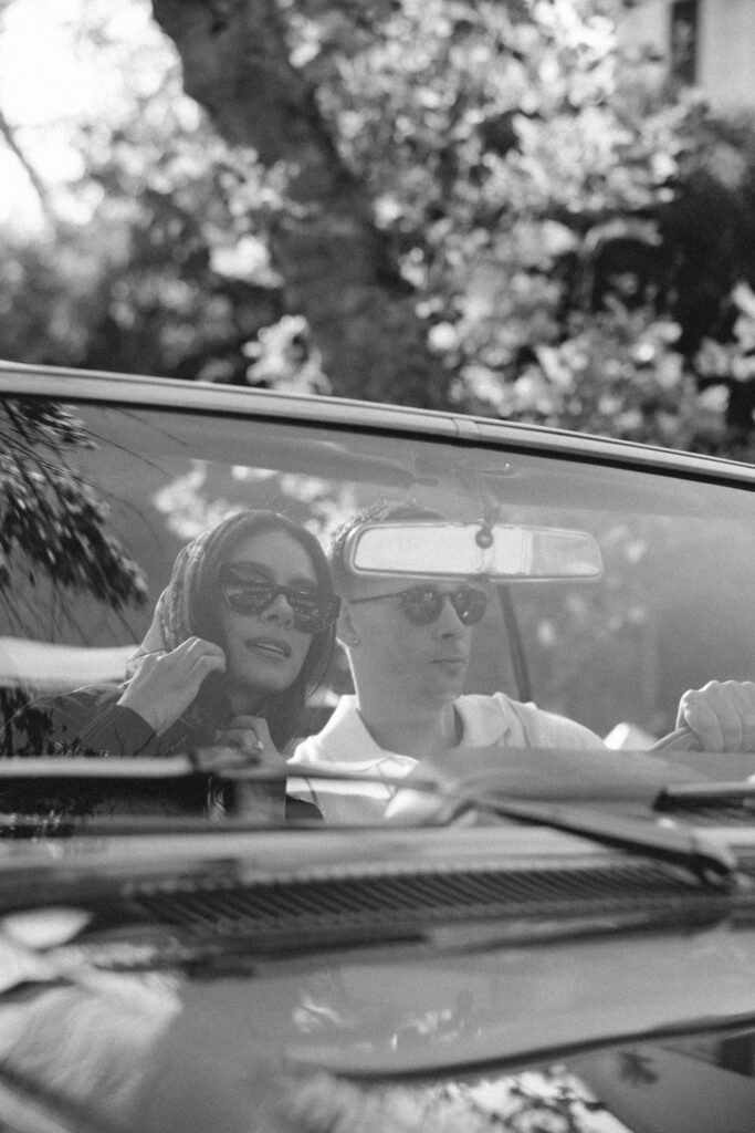 film engagement photos with vintage car