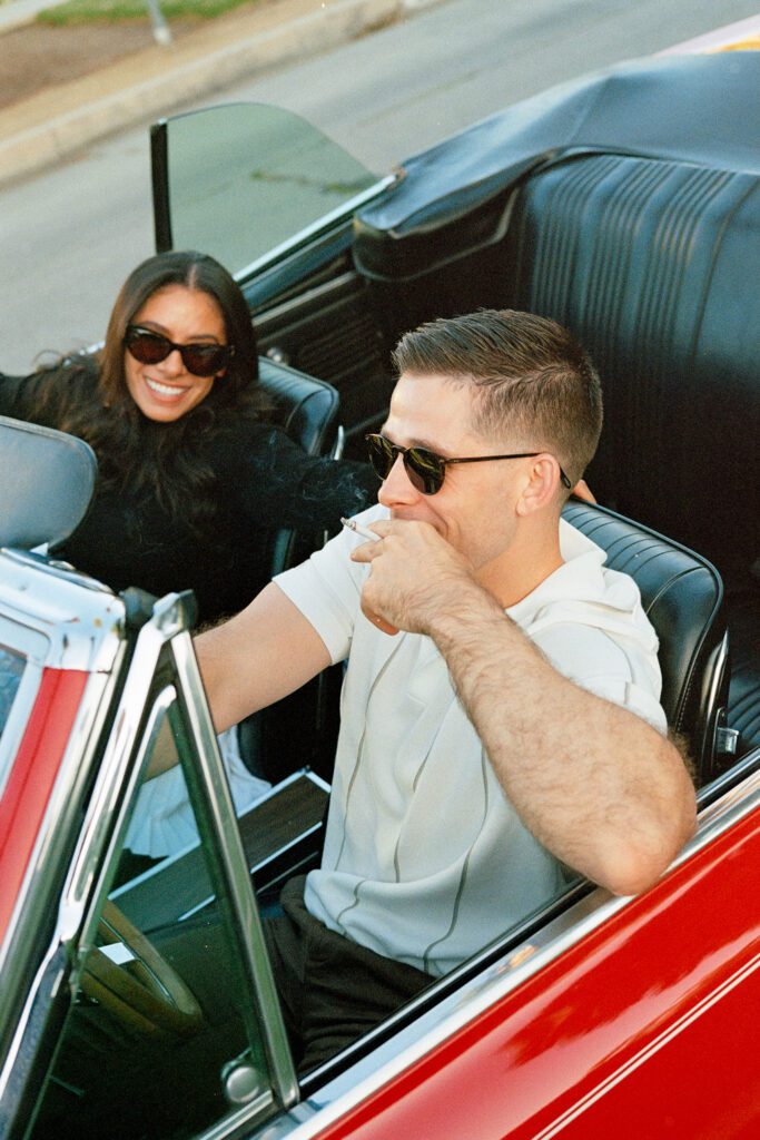 film engagement photos with vintage car