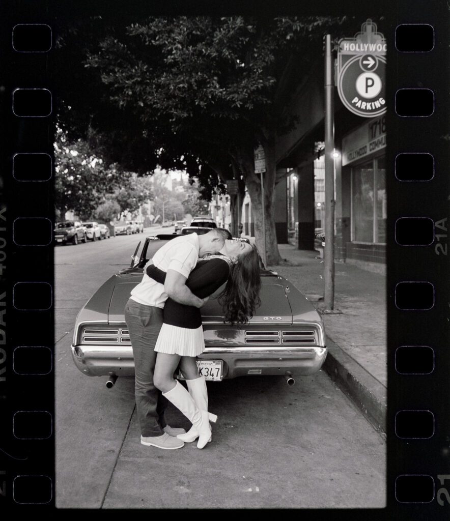 film engagement photos with vintage car