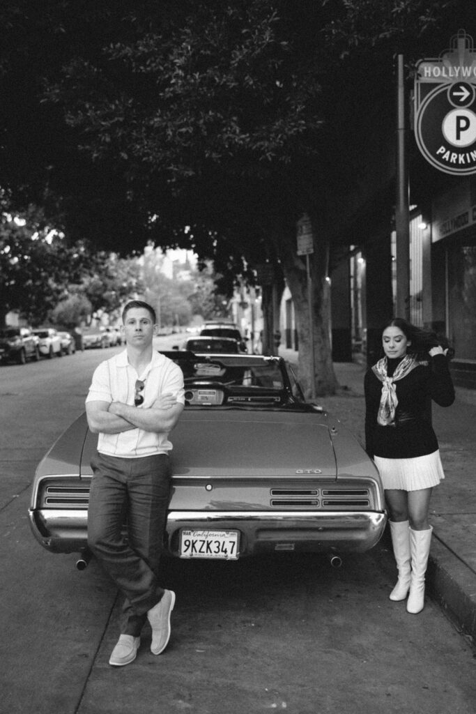 film engagement photos with vintage car